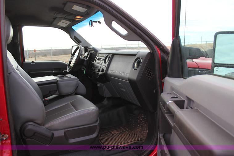 image for item J7577 2012 Ford F350 Super Duty XLT SuperCab flatbed pickup truck