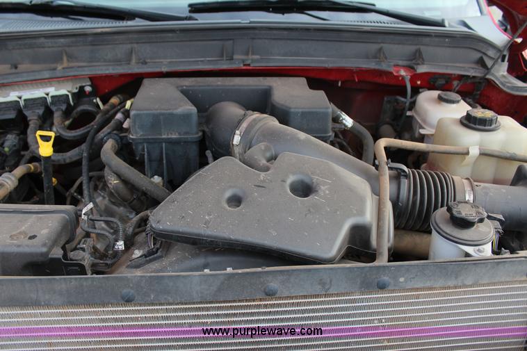 image for item J7577 2012 Ford F350 Super Duty XLT SuperCab flatbed pickup truck