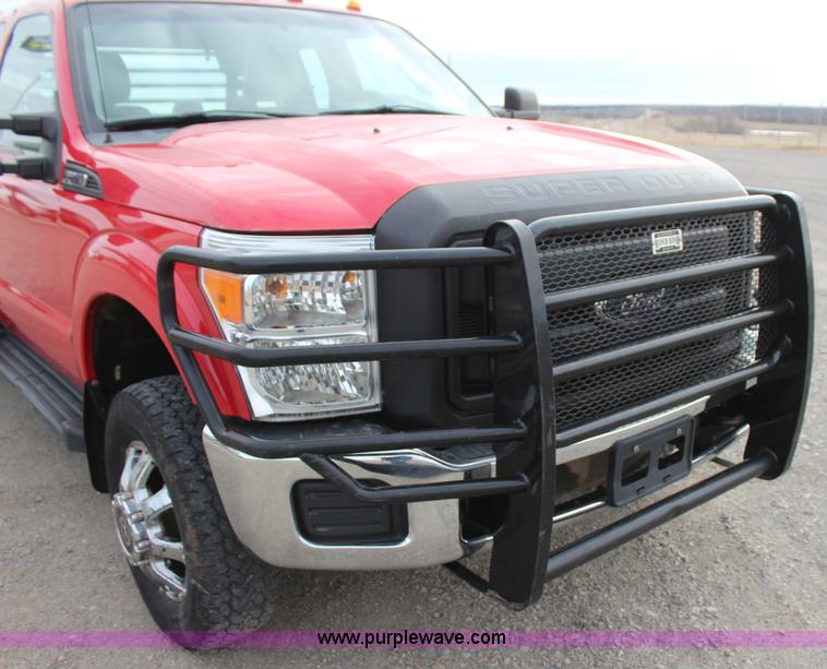 image for item J7577 2012 Ford F350 Super Duty XLT SuperCab flatbed pickup truck