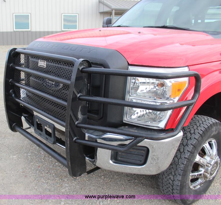 image for item J7577 2012 Ford F350 Super Duty XLT SuperCab flatbed pickup truck