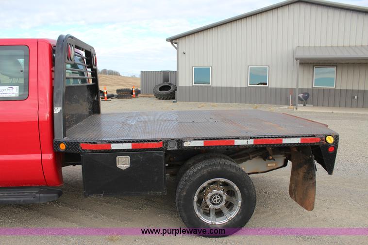 image for item J7577 2012 Ford F350 Super Duty XLT SuperCab flatbed pickup truck