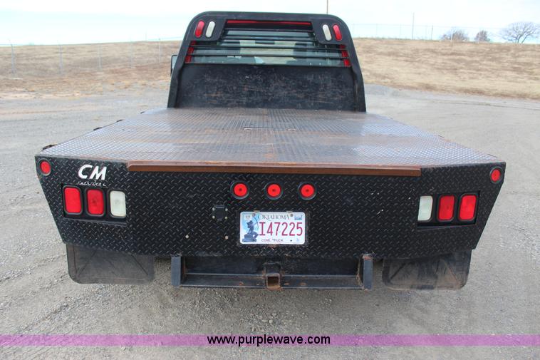 image for item J7577 2012 Ford F350 Super Duty XLT SuperCab flatbed pickup truck