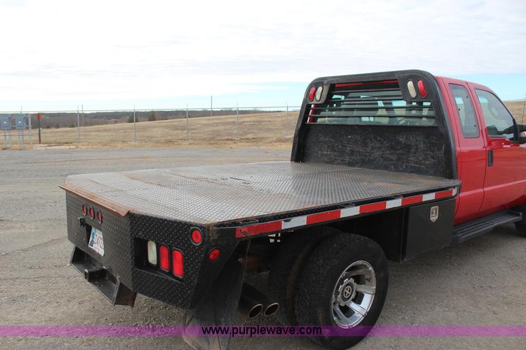 image for item J7577 2012 Ford F350 Super Duty XLT SuperCab flatbed pickup truck