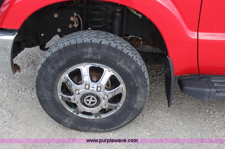 image for item J7577 2012 Ford F350 Super Duty XLT SuperCab flatbed pickup truck