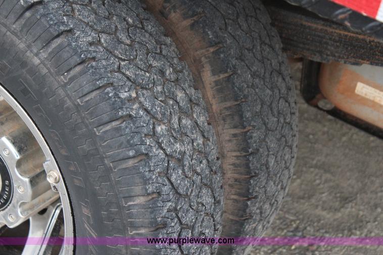 image for item J7577 2012 Ford F350 Super Duty XLT SuperCab flatbed pickup truck