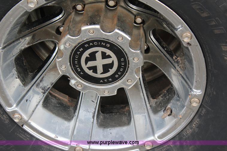 image for item J7577 2012 Ford F350 Super Duty XLT SuperCab flatbed pickup truck