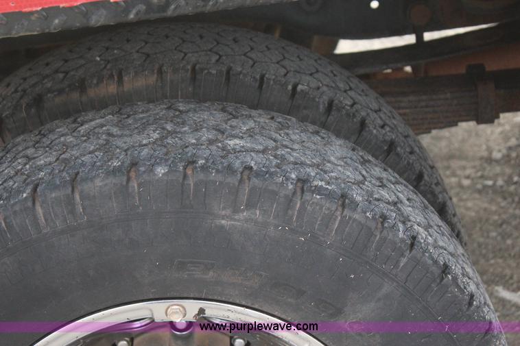 image for item J7577 2012 Ford F350 Super Duty XLT SuperCab flatbed pickup truck