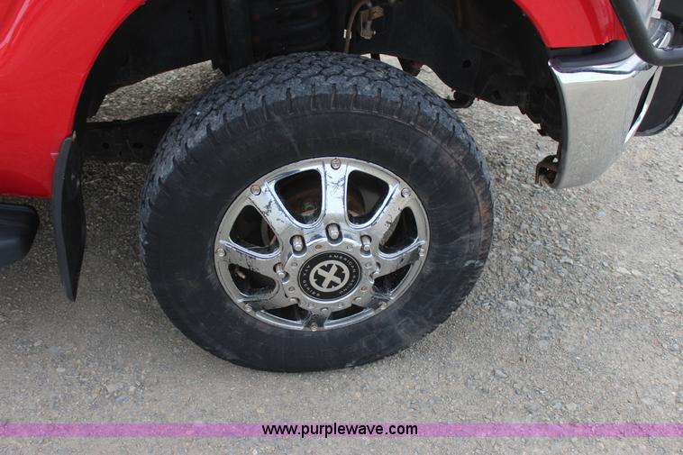 image for item J7577 2012 Ford F350 Super Duty XLT SuperCab flatbed pickup truck