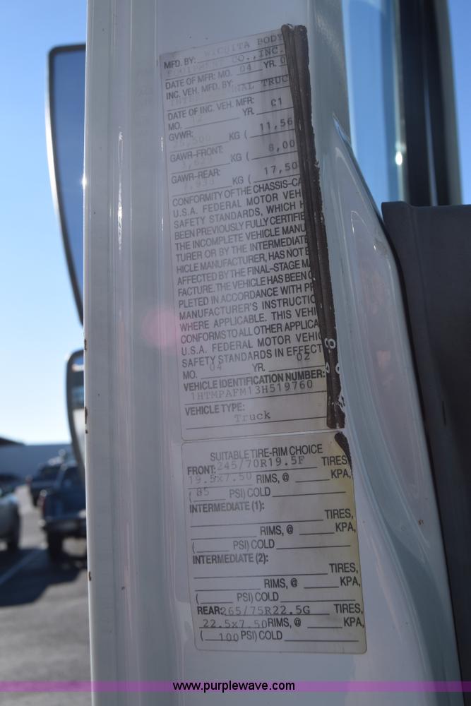 image for item L1061 2003 International 4200 flatbed truck