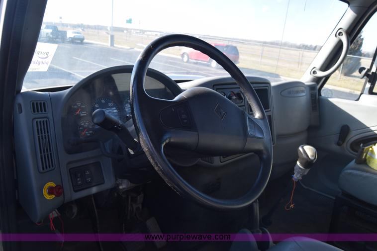 image for item L1061 2003 International 4200 flatbed truck