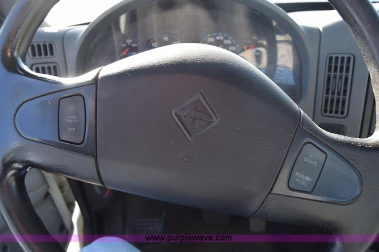 image for item L1061 2003 International 4200 flatbed truck