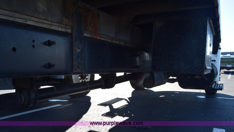 image for item L1061 2003 International 4200 flatbed truck