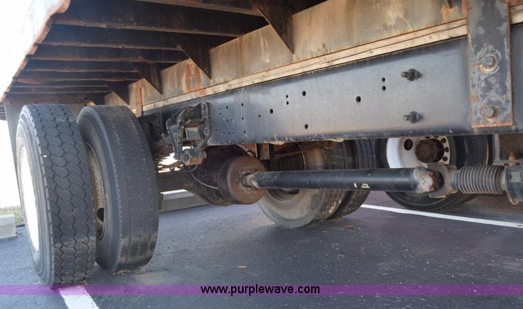 image for item L1061 2003 International 4200 flatbed truck