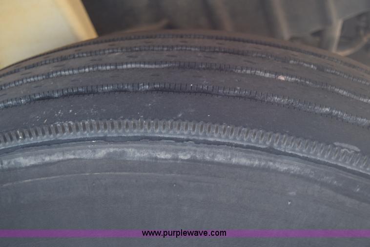 image for item L1061 2003 International 4200 flatbed truck