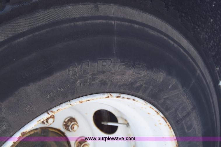 image for item L1061 2003 International 4200 flatbed truck