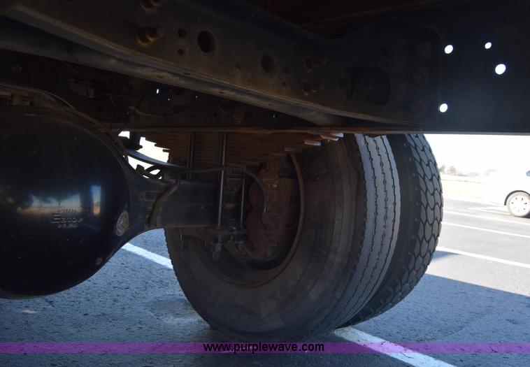 image for item L1061 2003 International 4200 flatbed truck