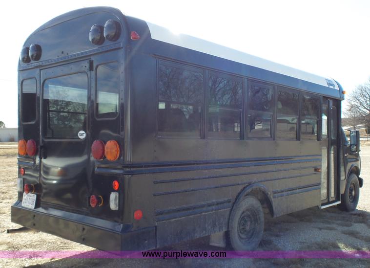 image for item L3654 2001 GMC Savana G3500 Cargo shuttle bus