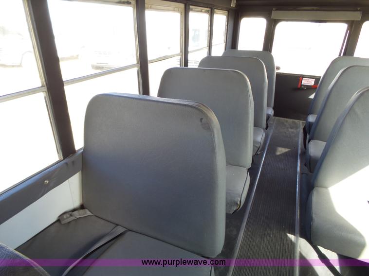 image for item L3654 2001 GMC Savana G3500 Cargo shuttle bus