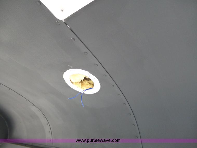 image for item L3654 2001 GMC Savana G3500 Cargo shuttle bus