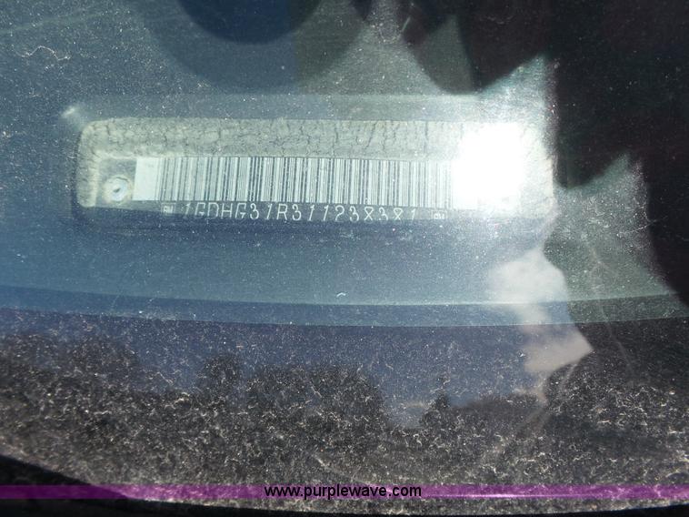 image for item L3654 2001 GMC Savana G3500 Cargo shuttle bus