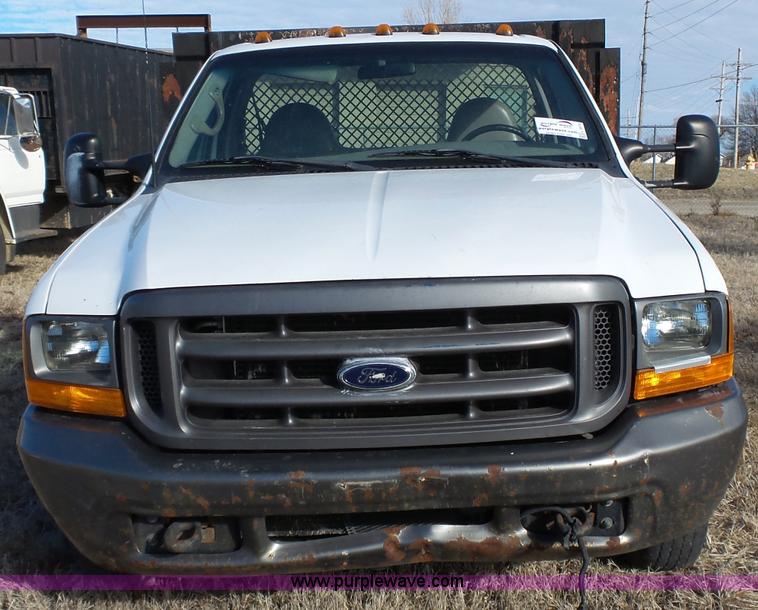 image for item L3674 2000 Ford F350 Super Duty XL flatbed pickup truck