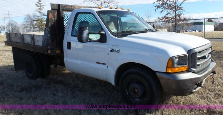 image for item L3674 2000 Ford F350 Super Duty XL flatbed pickup truck