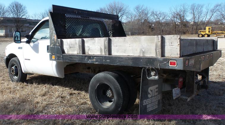 image for item L3674 2000 Ford F350 Super Duty XL flatbed pickup truck