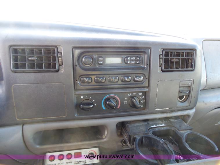 image for item L3674 2000 Ford F350 Super Duty XL flatbed pickup truck