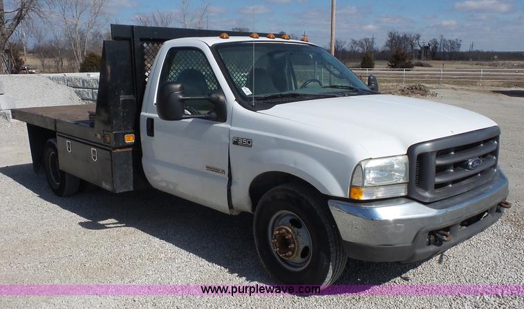 image for item L4774 2004 Ford F350 Super Duty flatbed truck