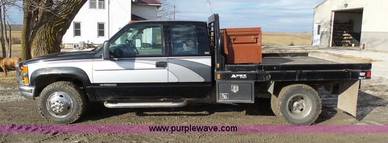 image for item L7069 1995 Chevrolet 3500 Ext. Cab flatbed pickup truck