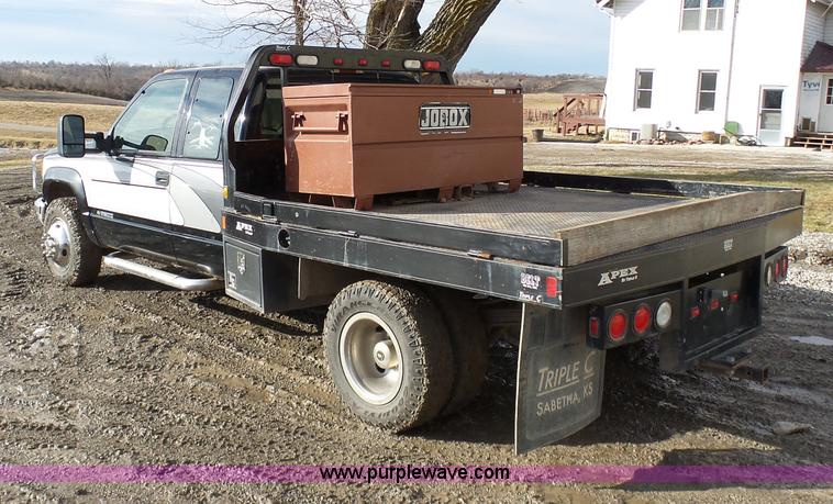 image for item L7069 1995 Chevrolet 3500 Ext. Cab flatbed pickup truck