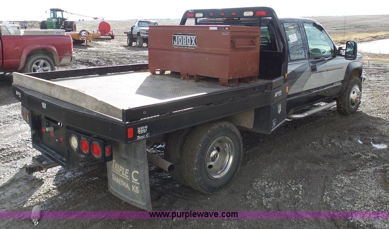 image for item L7069 1995 Chevrolet 3500 Ext. Cab flatbed pickup truck
