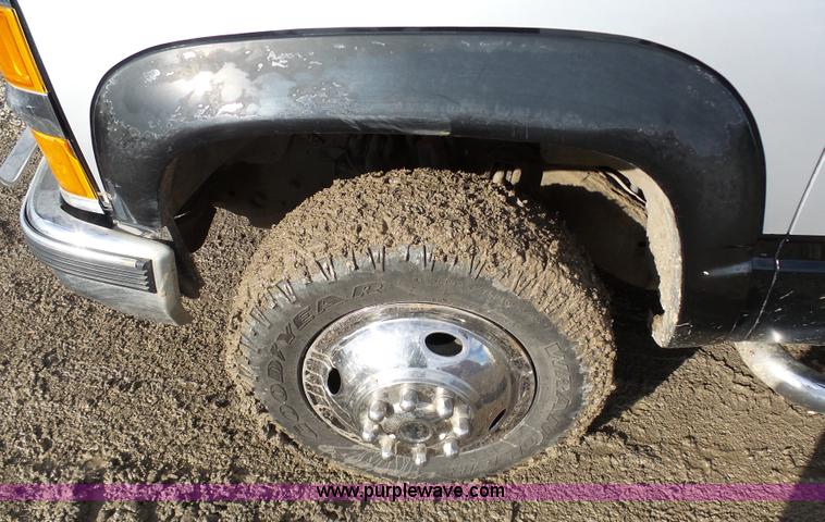 image for item L7069 1995 Chevrolet 3500 Ext. Cab flatbed pickup truck