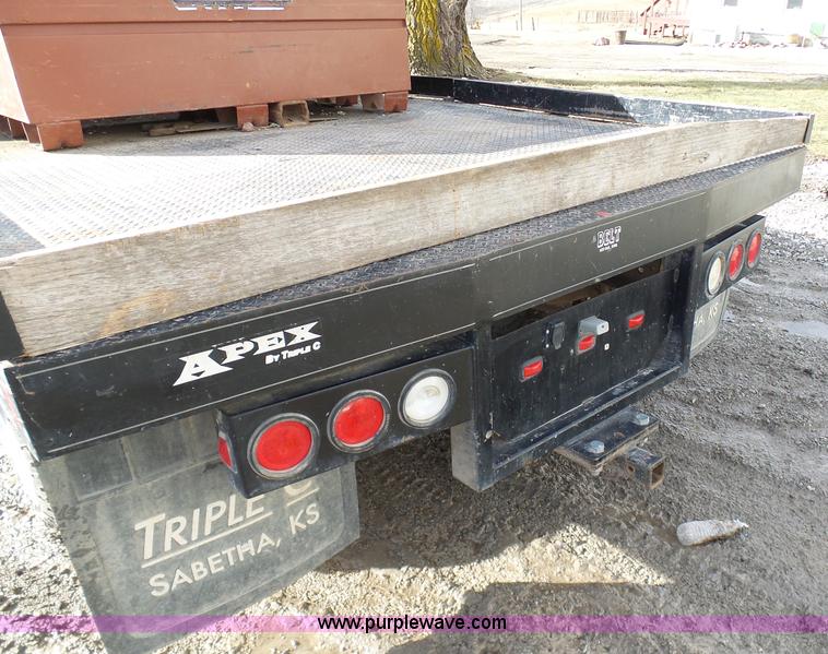 image for item L7069 1995 Chevrolet 3500 Ext. Cab flatbed pickup truck