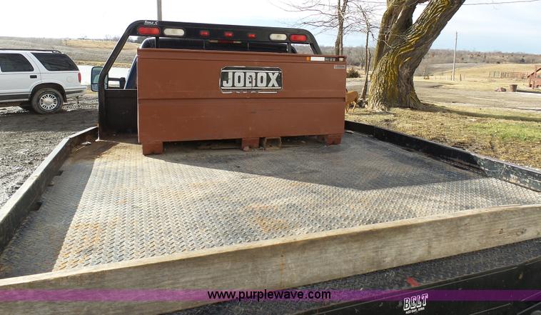 image for item L7069 1995 Chevrolet 3500 Ext. Cab flatbed pickup truck