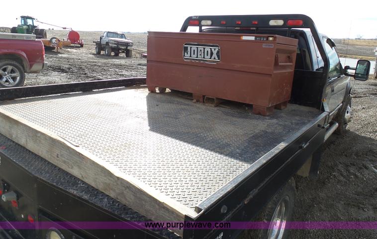 image for item L7069 1995 Chevrolet 3500 Ext. Cab flatbed pickup truck