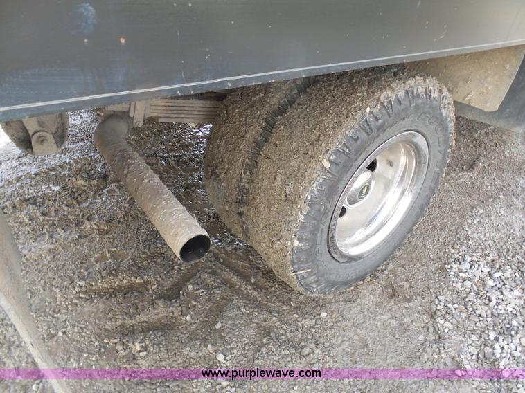 image for item L7069 1995 Chevrolet 3500 Ext. Cab flatbed pickup truck