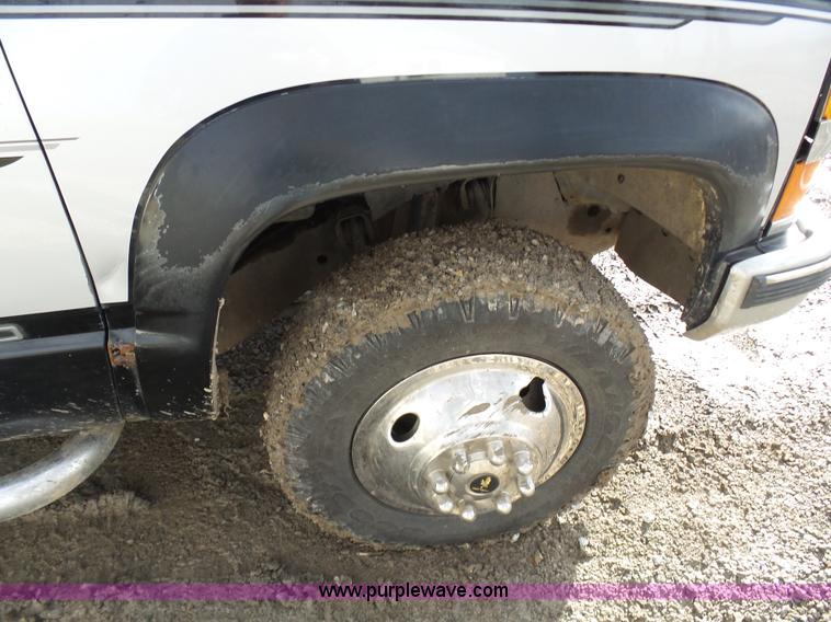image for item L7069 1995 Chevrolet 3500 Ext. Cab flatbed pickup truck