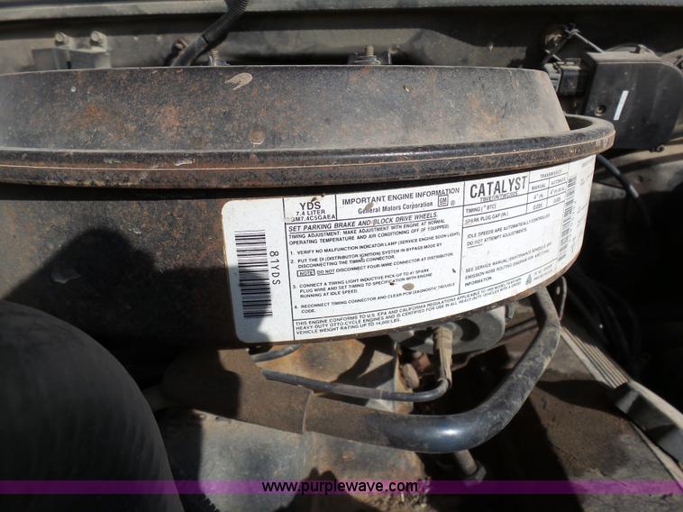 image for item L7069 1995 Chevrolet 3500 Ext. Cab flatbed pickup truck
