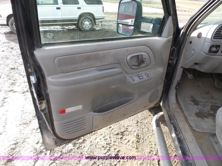 image for item L7069 1995 Chevrolet 3500 Ext. Cab flatbed pickup truck