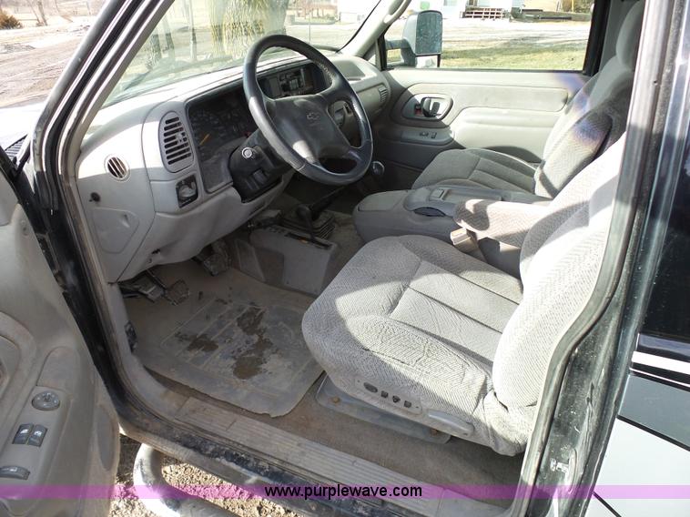 image for item L7069 1995 Chevrolet 3500 Ext. Cab flatbed pickup truck