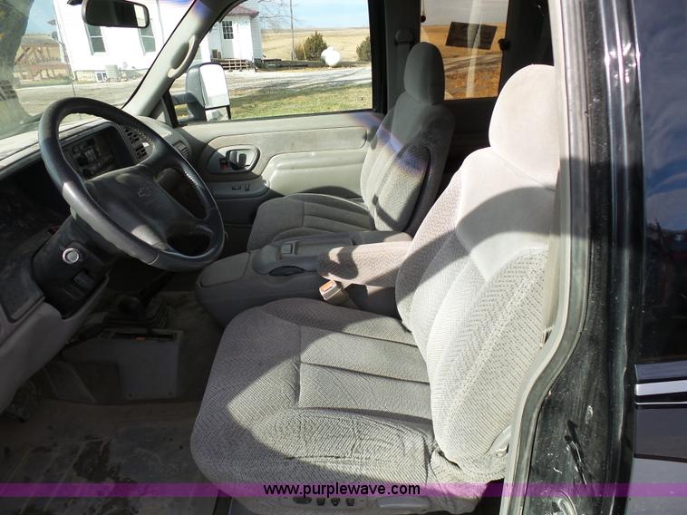 image for item L7069 1995 Chevrolet 3500 Ext. Cab flatbed pickup truck
