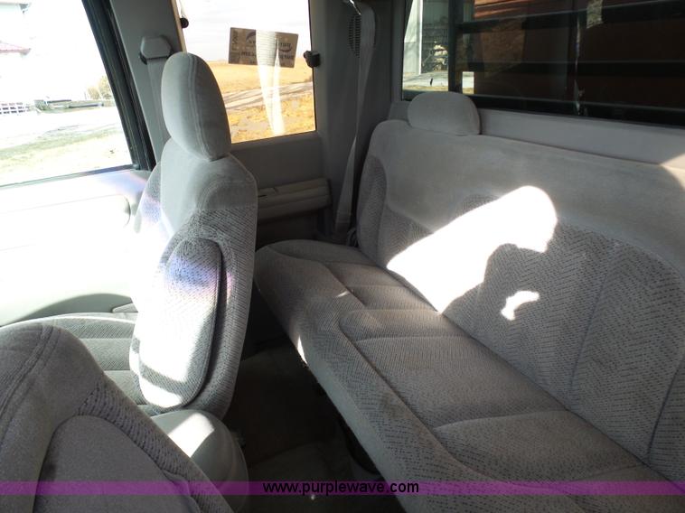 image for item L7069 1995 Chevrolet 3500 Ext. Cab flatbed pickup truck