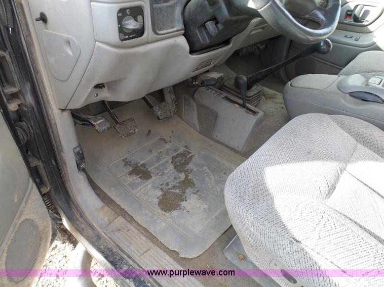 image for item L7069 1995 Chevrolet 3500 Ext. Cab flatbed pickup truck