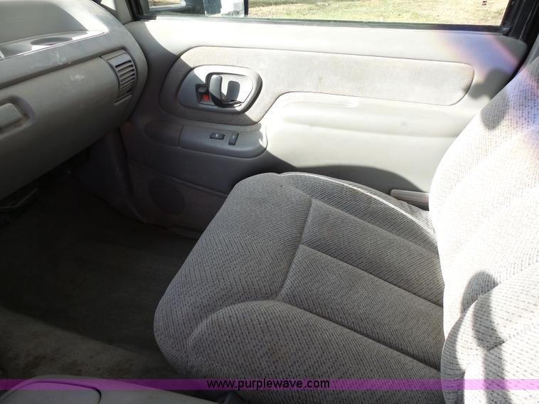 image for item L7069 1995 Chevrolet 3500 Ext. Cab flatbed pickup truck