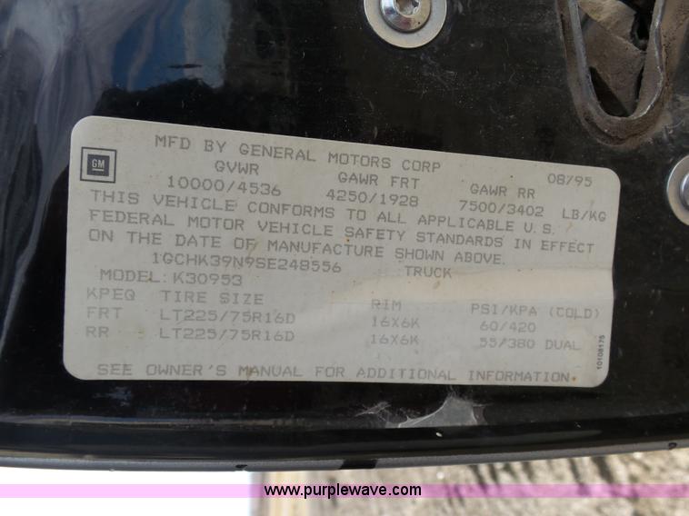 image for item L7069 1995 Chevrolet 3500 Ext. Cab flatbed pickup truck