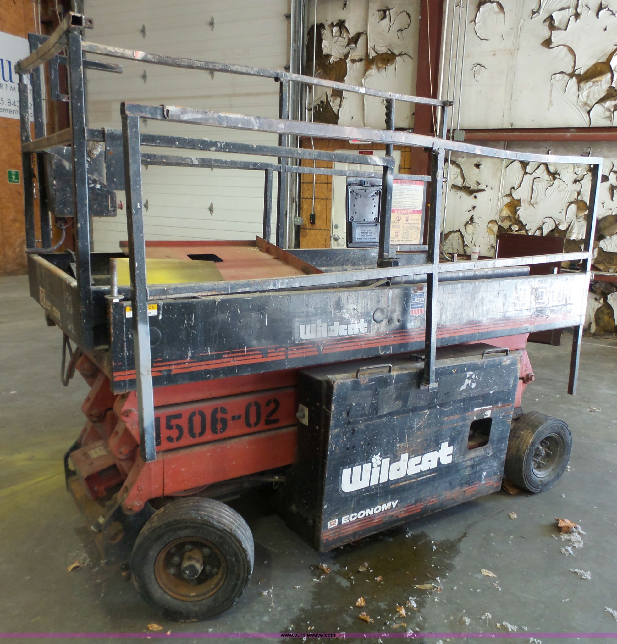 Economy Wildcat 3000 scissor lift in Lawrence, KS Item BT9494 sold