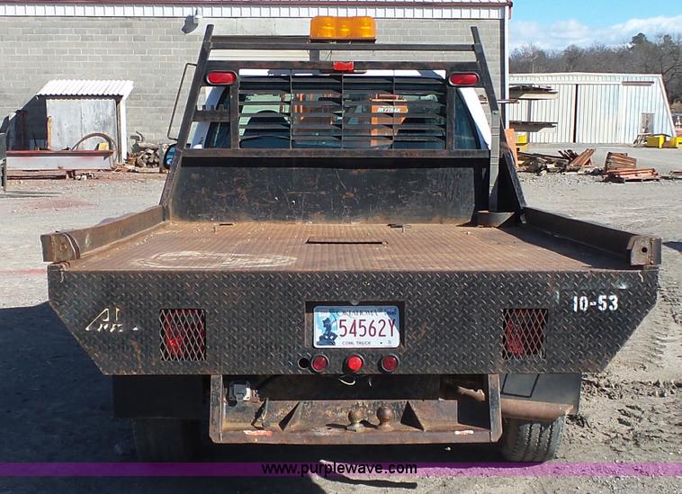 image for item J7599 2000 Ford F250 Super Duty flatbed pickup truck