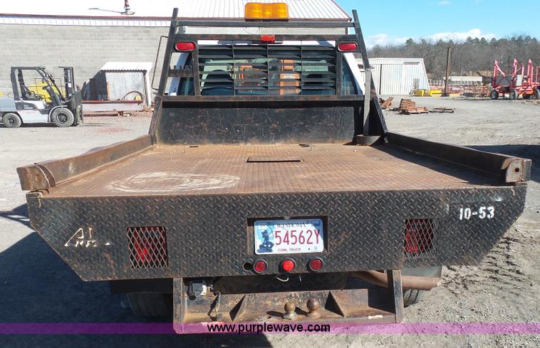 image for item J7599 2000 Ford F250 Super Duty flatbed pickup truck