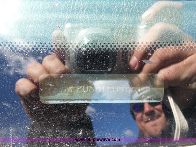 image for item J7599 2000 Ford F250 Super Duty flatbed pickup truck